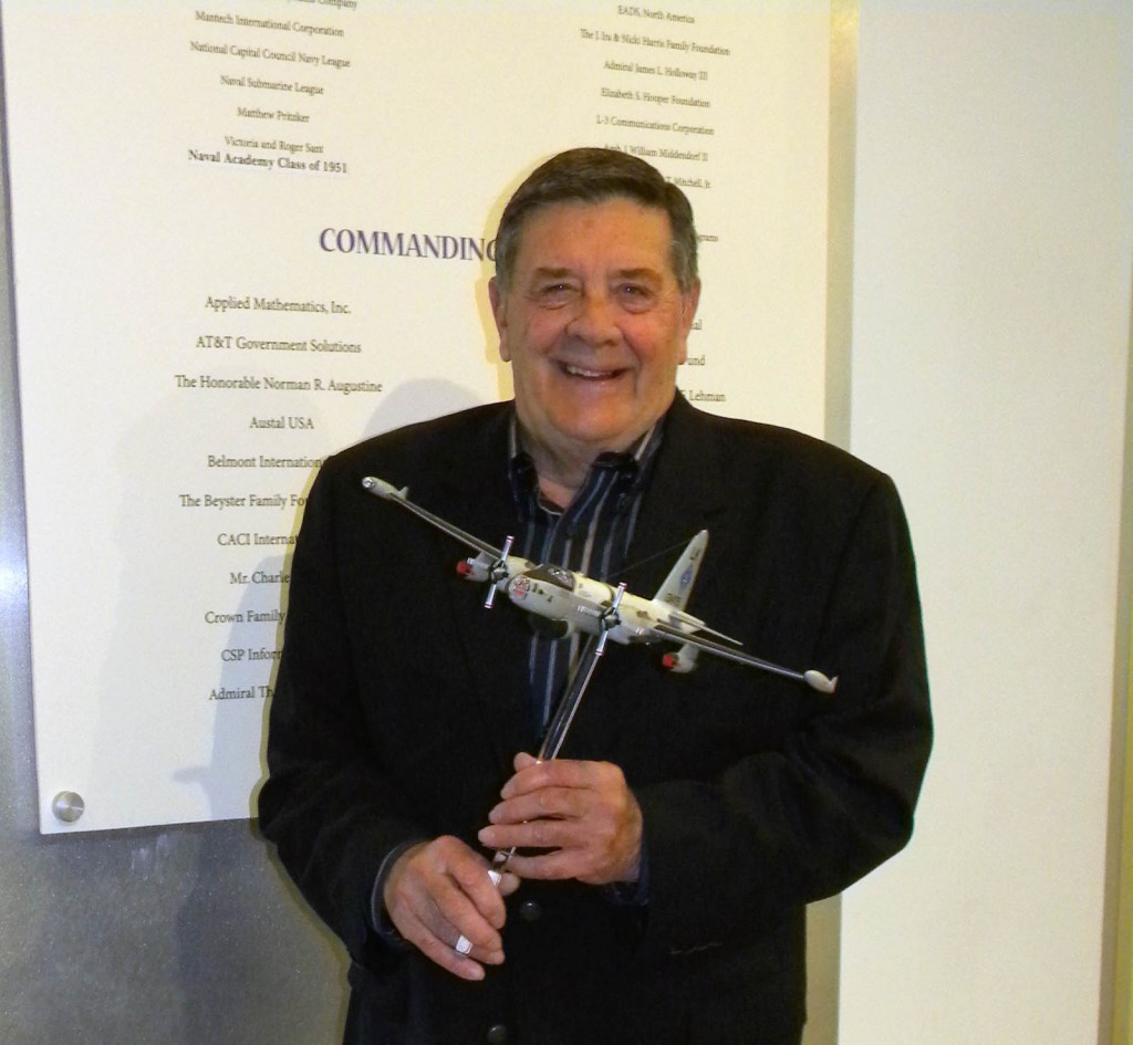 RADM P.D. Smith poses with the P2V-5 Neptune model he sponsored for the Cold War Gallery.