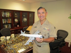 Adm. Harris and the P-3A Orion model now in the Cold War Gallery