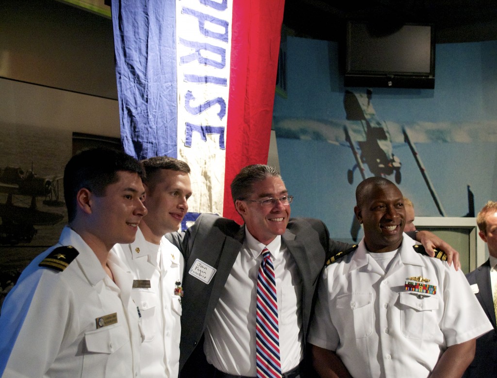 NORFOLK, VA (May 6, 2014) An Enterprise Rent-A-Car Rep for the Norfolk area snaps a photo with current sailors of the "Big E." (NHF Photo by Matthew Eng/Released)