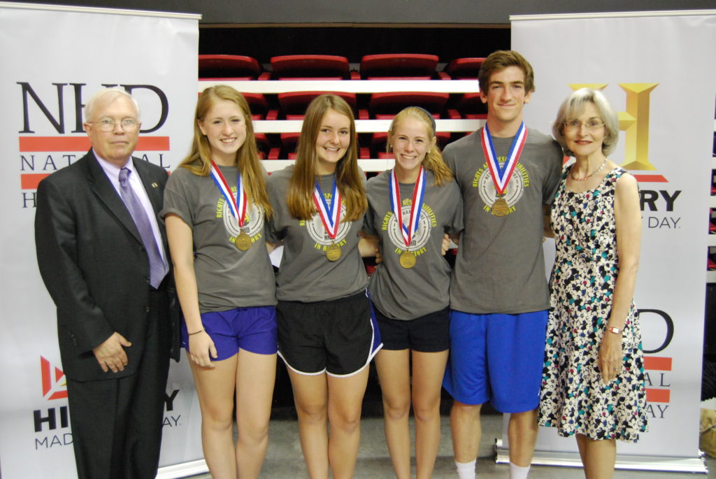 Captain Charles Chadbourn, USN (Ret.), Rosemary Coskey, and the Senior Division Winners from Exeter High School