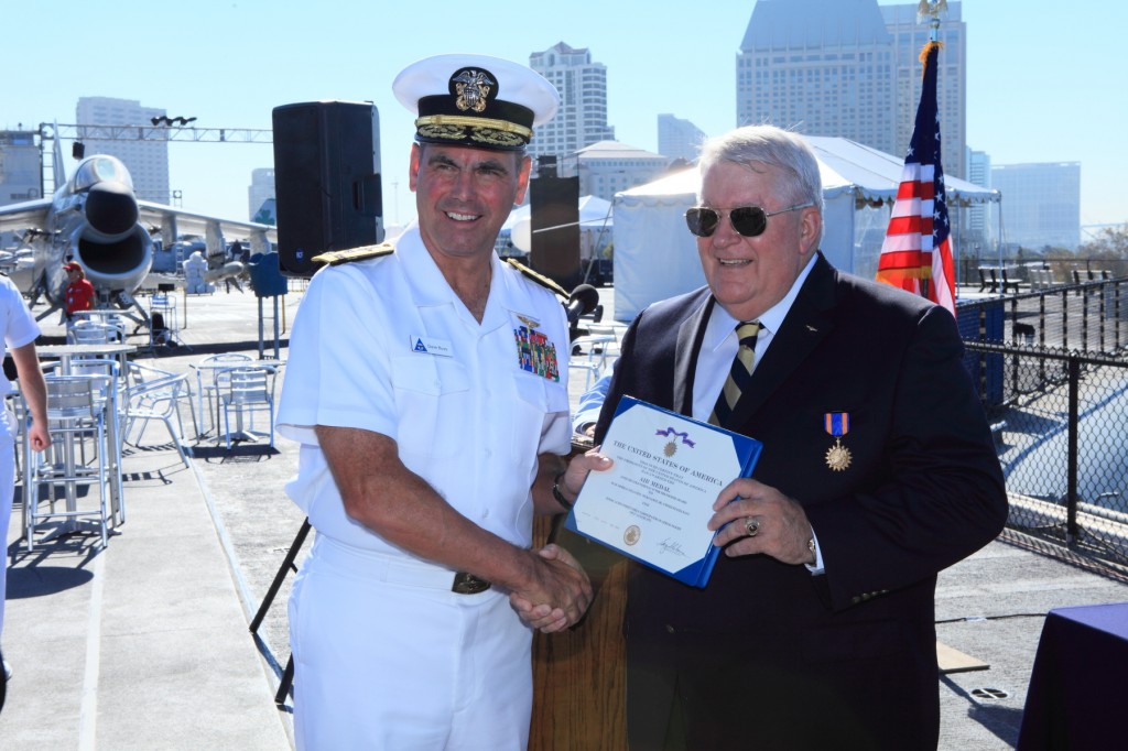 Rear Admiral William W. Pickavance, Jr. receives his Air Medal award from Vice Admiral David H. Buss, Commander, Naval Air Forces
