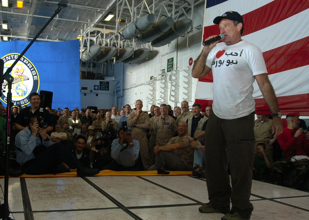 Arabian Gulf (Dec. 19, 2003) -- Actor/comedian Robin Williams entertains the crew of USS Enterprise (CVN 65) during a holiday special hosted by the United Service Organization (USO).  (US Navy Photo 031219-N-9742R-001)