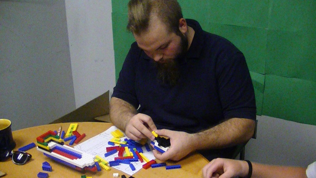 HRNM Intern Jordan Hock works diligently on LEGO Models, Summer 2011 (Photo by Matthew Eng/HRNM)