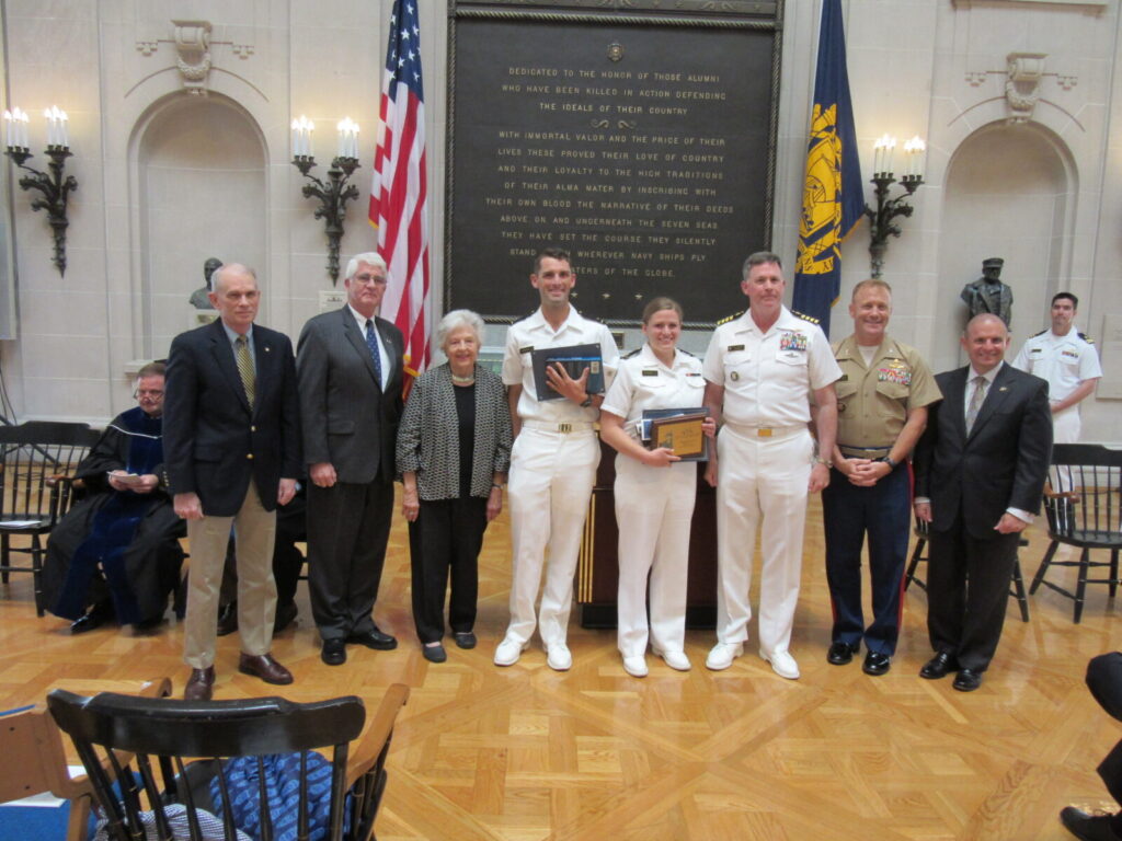 LCDR Tom Cutler, USN (Ret.), U.S. Naval Institute; CAPT Todd Creekman, USN (Ret.), NHF; Mrs. Ingrid Beach; Midshipman First Class Philip Youngberg; Midshipman First Class Dana Petersen; CAPT Craig Felker, USN, History Department Chairman; COL Paul Montanus, Humanities and Social Sciences Division Director; Dr. Andrew Phillips, Academic Dean
