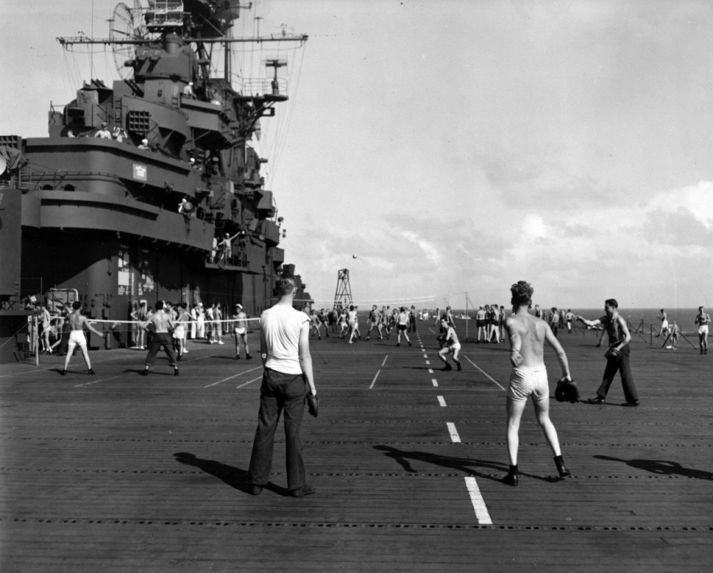 Though most ships did not have enough space for a baseball diamond, ballgames while on dry land - and games of catch while at sea - kept sailors in shape. Baseball games were even played on the deck of aircraft carriers. (Puget Sound Naval Museum)