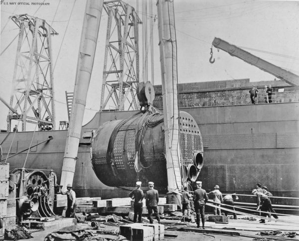 One of Jupiter's boilers being lifted aboard for installation while fitting out at Navy Yard Mare Island, circa 1912-13. Navy Yard Mare Island photo (NavSource)