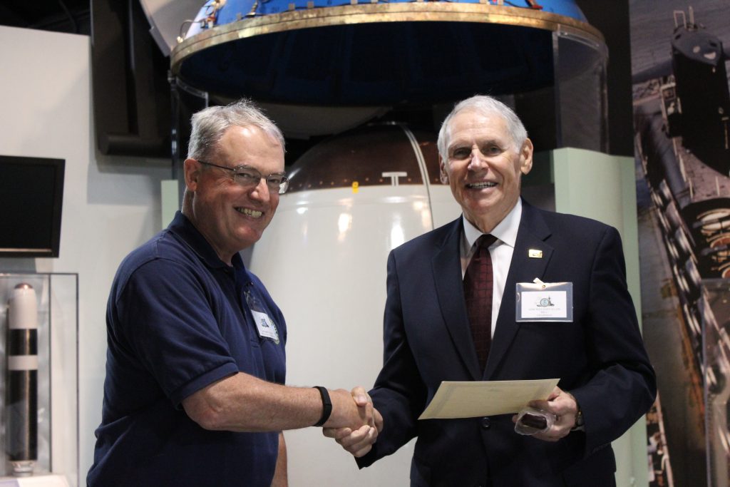 Captain Paulson receives his award from NHF Chairman William Fallon (NHF Photo/Matthew Eng/Released)