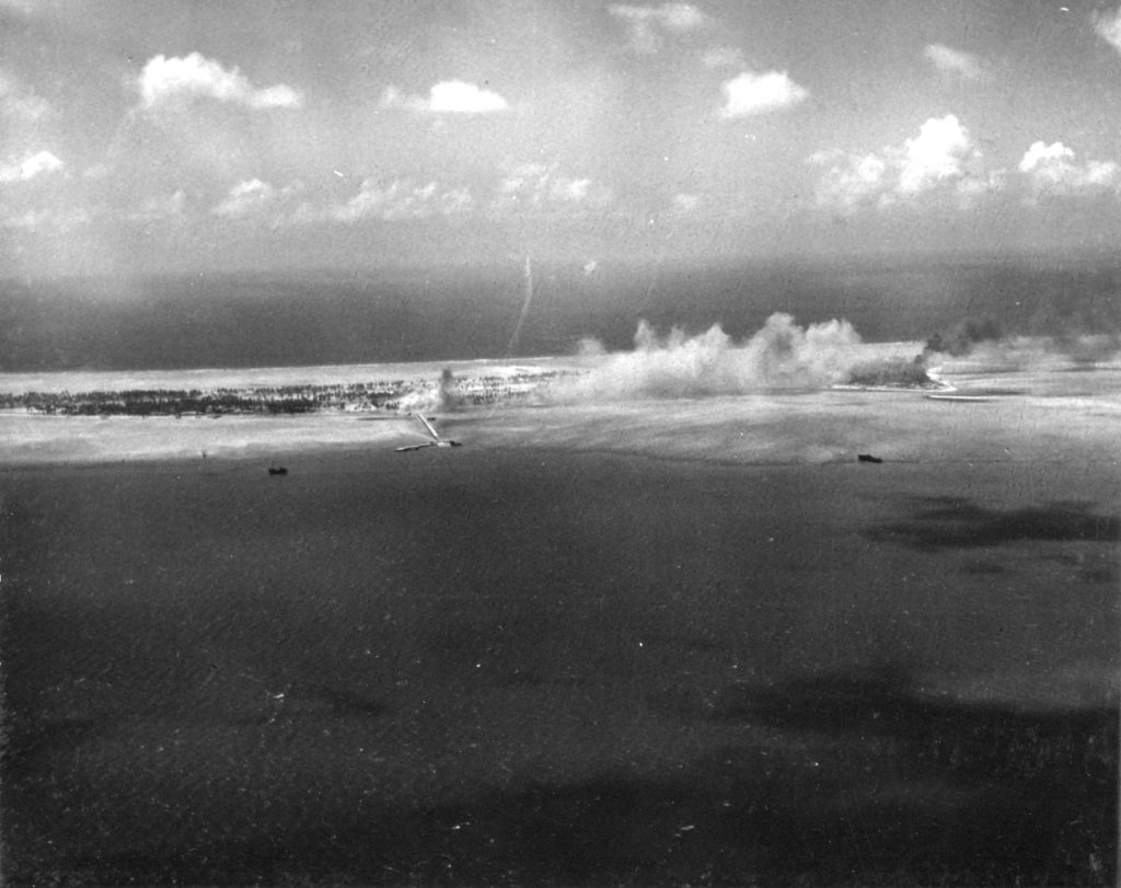 Bititu (Betio) under attack. The Pier area is in the foreground. (US Navy photo: Scanned by John G. Lambert)