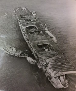 USS Independence being made ready by two tugs to be towed out and scuttled. (Photo from: John G. Lambert supplied courtesy of the US National Park Service, San Francisco CA)