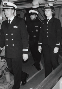 Ensign Elizabeth Bres tours the destroyer tender USS Puget Sound in November 1, 1978. Bres was one of the first group of women officers to be assigned duty on Navy ships. (NHHC Photo/James L. Leuci, ITCM, USN (Ret.)) 